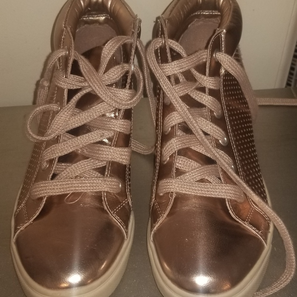 Rose Gold sneakers sold